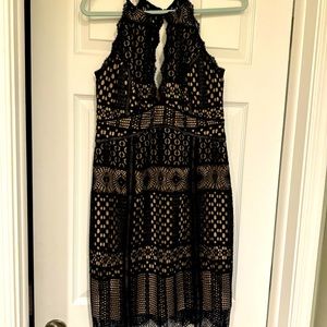 Black and nude lace cocktail dress.
